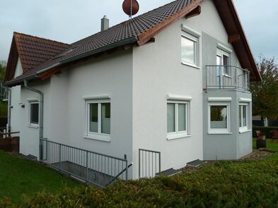 Haus streichen lassen mehrere Farben Beispiel